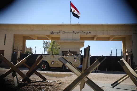 An Egyptian soldier keeps watch at the closed Rafah border crossing, between southern Gaza Strip and Egypt